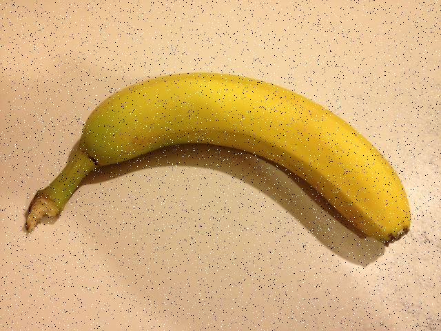 Obrazek banana z szumem typu sól i pieprz